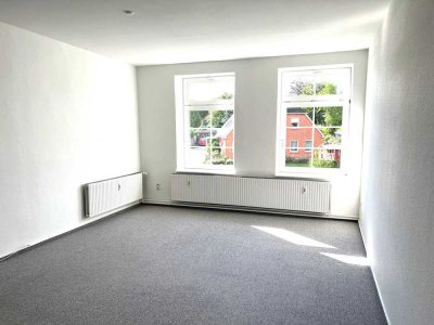 Hübsche und großzügige 3 ZKB Wohnung im 1.OG + Garage + Gartenteil