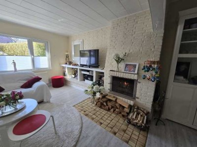 "Provisionsfrei" Schöne Erdgeschosswohnung mit Kamin und grossem Gartenanteil und Doppelcarport in z