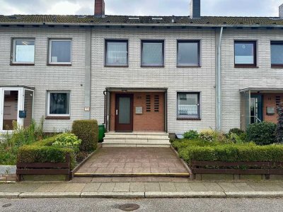 Willkommen Zuhause – gepflegtes Reihenmittelhaus mit Wintergarten, Gartenidylle und viel Potenzial