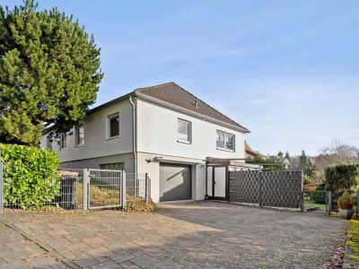 Familienfreundliches zuhause: Modernisierter Bungalow mit Einliegerwohnung in Kelkheim-Eppenhain