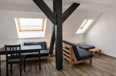 Solide Kapitalanlage: Vermietetes Dachgeschoss mit ca. 4 % Rendite nahe Uni & Klinikum