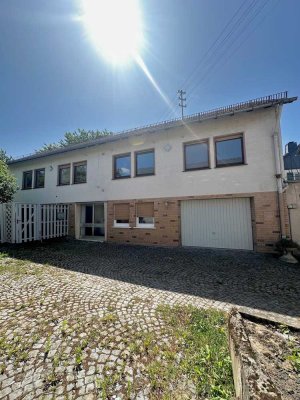 Großzügige 4-Zimmer-Wohnung mit großem Garten und Garage – Ruhige Lage in Weisel