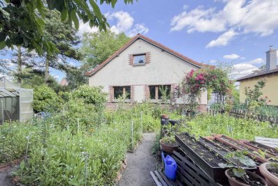 Ideell geteiltes Grundstück mit Bestandsbungalow - Chance für Sanierung oder Neubeginn