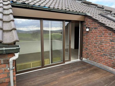 Schöne 4-Zimmer-Dachgeschosswohnung mit traumhaften Ausblick und Einbauküche in Taunusstein-Orlen