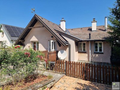 NEUER PREIS - Perfekte Familienwohnung mit Garten und Garage