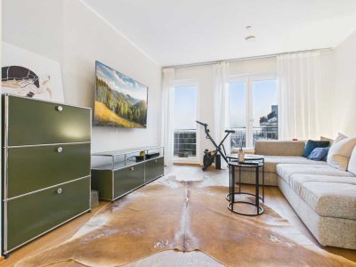 Moderne 2-Zimmer-Wohnung mit großem Balkon, Einbauküche & Tiefgaragenstellplatz in Kalbach-Riedberg