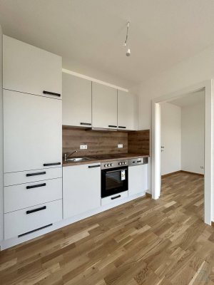 Vermietete 2-Zimmer Neubauwohnung FÜR ANLEGER |mit Balkon und Küche im 2.OG! Provisionsfrei!
