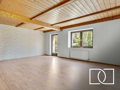 Raumwunder! Großzügiges Zweifamilienhaus mit Werkstatt, Garten und Doppelgarage in ruhiger Lage