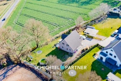 Hüttenbusch | Modernes Einfamilienhaus mit großem Grundstück & viel Fläche