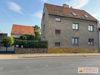Haus mit Einliegerwohnung mit Großgarage und Garten in Putlitz