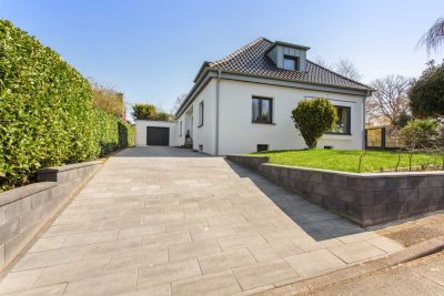 Stilvoll kernsaniertes Einfamilienhaus mit großzügigem Garten – Liebevolle Details, super Anbindung