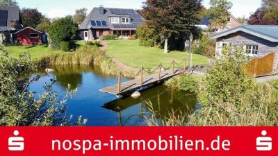 EFH mit Wintergarten, Garage, 2 Doppelcarports, PV-Anlage u. Gartenteich auf großem Grundstück