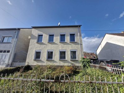 Freistehendes Einfamilienhaus mit viel Potenzial in zentraler Lage