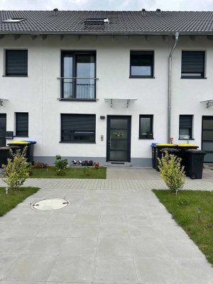 Modernes Reihenmittelhaus mit sonnigem Garten im Herzen von Bad Krozingen