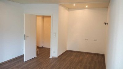 Lichtdurchflutete 1,5-Zimmer-Wohnung mit Küche und Blick ins Grüne