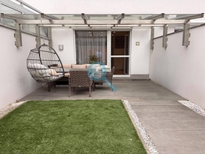 Voll unterkellertes Reihenhaus mit Terrasse, Garten, Garage und Carport in autofreier Wohnlage
