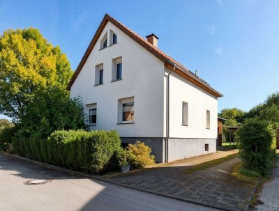 Gepflegtes Einfamilienhaus mit Anbau und großem Garten