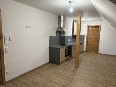 Erstbezug mit Einbauküche: Exklusive 1-Zimmer-DG-Wohnung mit gehobener Innenausstattung in Aresing