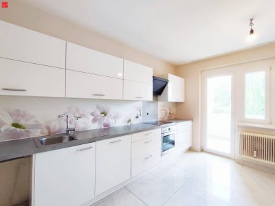 Familienfreundlicher Wohntraum mit gemütlicher Loggia und herrlichem Blick ins Grüne