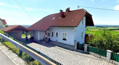 Gepflegtes Einfamilienhaus mit Aussicht in Hanglage – Zwei Wohneinheiten mit viel Potenzial