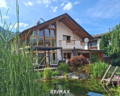 Sonnenresidenz in Prutz – Einfamilienhaus in Bestlage mit idyllischem Teich!