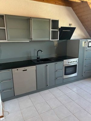 Ansprechende und gepflegte 3-Raum-DG-Wohnung mit Terrasse und Einbauküche in Kitzingen