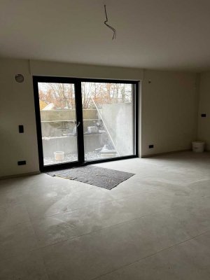 Gehobene KfW 40 2-Zimmer UG.-Wohnung mit Terrasse