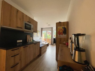 Vollmöblierte 1-Zimmer Neubauwohnung mit Balkon
