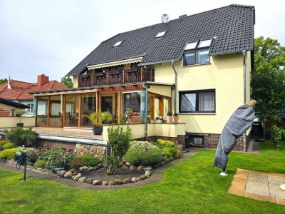 Gepflegtes 1- bis 2-Familienhaus mit Souterrain, Wintergarten, Kamin und Balkon