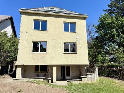Großzügiges Zweifamilienhaus mit Ausbaupotential auf 4 Ebenen in Wien-Atzgersdorf