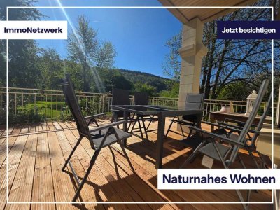 traumhafte Wohnung mit sonniger Terrasse und Garten sowie Parkplätzen in grüner Lage