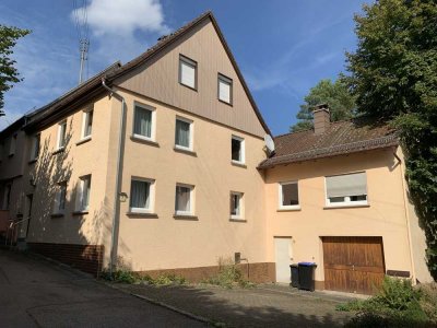 Gepflegtes, einseitig angebautes Wohnhaus mit Garage u. separatem Gartengrundstück
