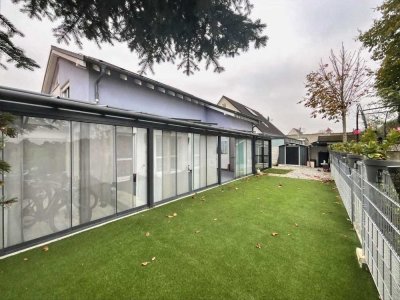 Exklusives Wohnen für Anspruchsvolle -
Feldrand mit Wintergarten und ELW