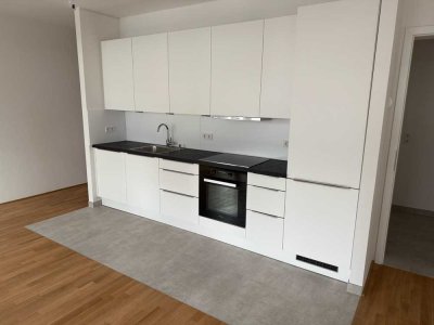 Erstbezug! Exklusive 1-Zimmer-Neubauwohnung mit Einbauküche, Walk-in Dusche& Tiefgarage in Oberursel