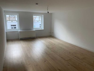 1-Zimmer-Wohnung im 1. Obergeschoss mitten in Fallersleben