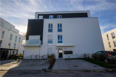 Erdgeschosswohnung mit Terrasse, Gartenanteil und Außenstellplatz