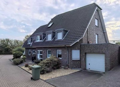 Schöne Erdgeschosswohnung mit Souterrain und kleinem Garten