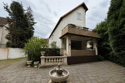 Vielseitiges Wohn- und Geschäftshaus mit großem Grundstück und Entwicklungspotenzial in Frankfurt...