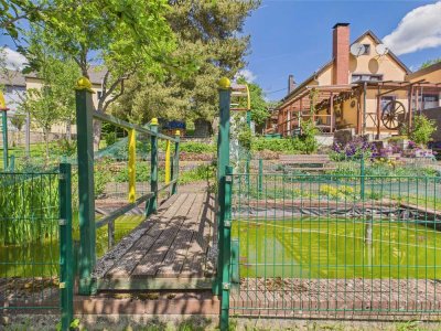 Zweifamilienhaus mit großzügigen Traumgarten & Baugrundstück