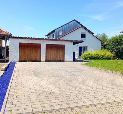 Perfekt für Familien und Kapitalanleger! Immobilie mit viel Potential in sehr ruhiger Lage