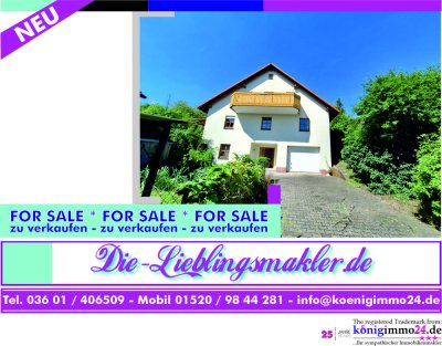 Einfamilienhaus mit Einliegerwohnung, großes Grundstück, Garage & toller Aussicht | Zeil am Main