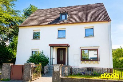 Vorstadtanwesen mit gepflegtem Garten, Charme und Entwicklungsmöglichkeiten in Aschaffenburg