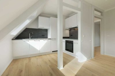 Moderne Dachgeschosswohnung mit Balkon und ausgebauten Spitzboden in Lübeck