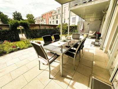 Exklusive EG-Wohnung mit Hauscharakter: 46 m² überdachte Terrasse, Garten, A+ Energie, 2 Carports