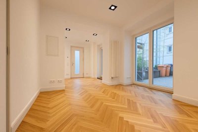 Wunderschöne, ruhige Remisen Neubau-Gartenwohnung mit Terrasse.