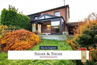 Gepflegtes Haus mit Wintergarten, Garten und Garage – ideal für Familien