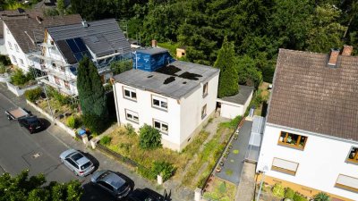 Sanierungsobjekt mit viel Potenzial – Zweifamilienhaus auf dem Heddesdorfer Berg am Stadtwald