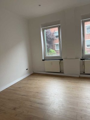 Stilvoll sanierte 3-Zimmer-Altbauwohnung mit Gartenanschluss und Kamin in Beuel-Mitte