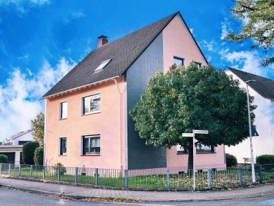 Attraktives Mehrfamilienhaus mit 3 Wohneinheiten, Gartenterrasse und Garagenhof