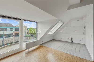 Maisonette mit Blick in den Himmel – Zwei Ebenen, Balkon und Tiefgarage in ruhiger Wohnanlage